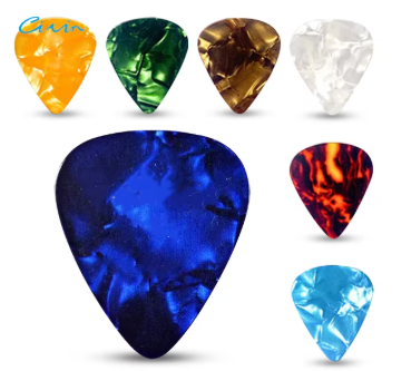 Set of colorful guitar picks on a white background