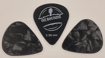 Three black guitar picks with 'Oz Soundz' branding on a light gray background